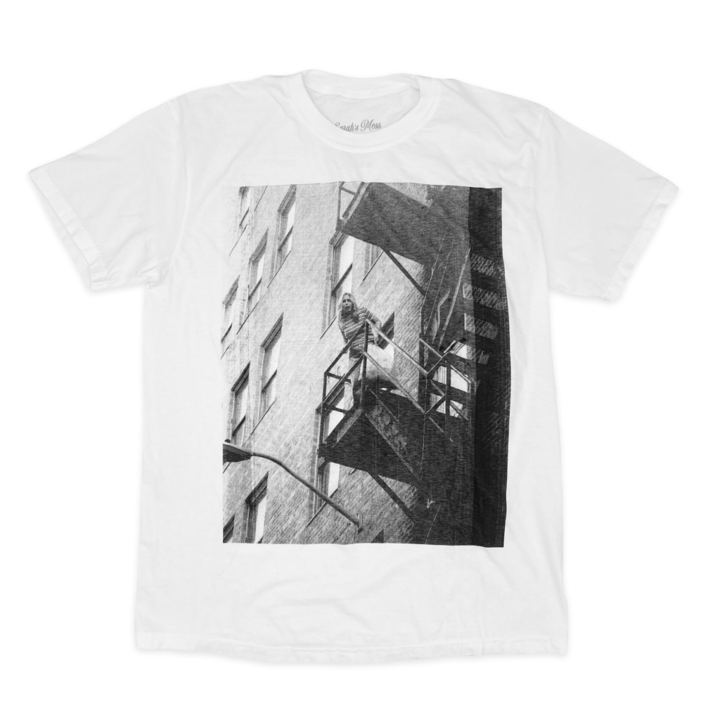 Studio-style shot of the Scream Tee Misprint on a transparent background, featuring the misprinted black-and-white image from the movie.